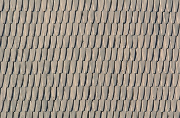 The patterned wooden roof of the historic building.Texture or background.