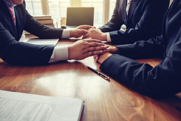 Businessman consoling his friends after failing to do business.