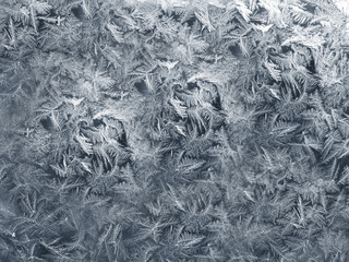 Frost drew an icy pattern on the window.Texture or background.