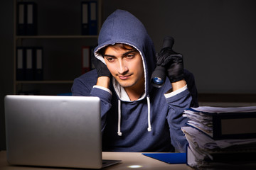 Thief trying to steal personal data in identity theft concept