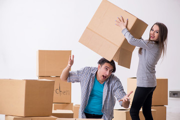 Young pair moving to new flat 