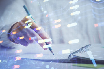 Double exposure of woman's hands on background with technology and digital coding icons. Data development concept. Close up.