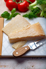Original italian cheese, aged Parmesan cow milk cheese, pieces of Parmigiano-Reggiano