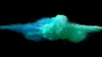 Collision of colored powder isolated on black