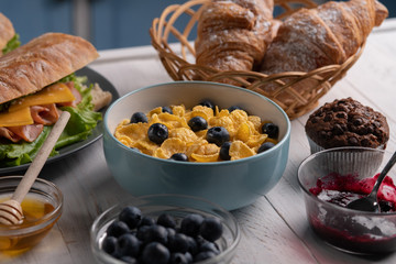 Delicious croissant. Breakfast. Cornflakes. Cereal baguette. Food. Sweet lunch. Bowl corn flakes. Fresh healthy meal