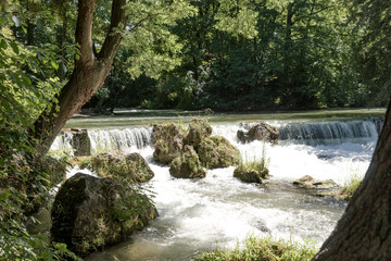 Water of the isar in The English Garden, Munich, Germany.