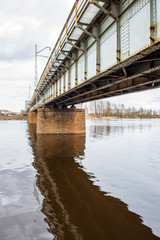 metal bridge over the river in country