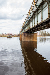 metal bridge over the river in country