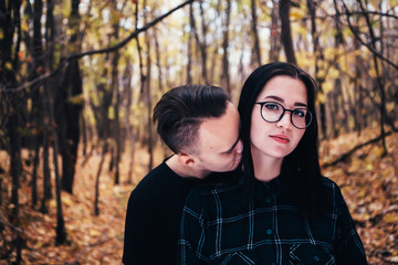 Fototapeta premium young man and woman in the autumn forest