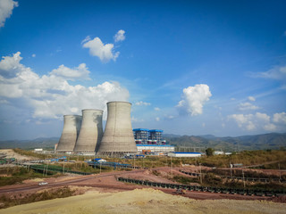 Coal power plant on blue background.