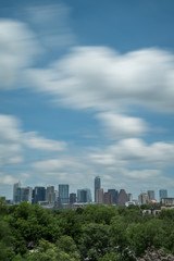 Fototapeta na wymiar View of Austin Skyline From a Distance With Cloudy Skies