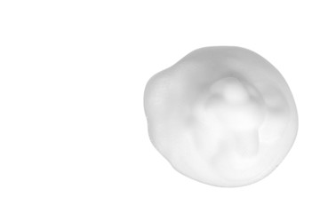 White foam bubbles, beauty smooth mousse, close up photo.
