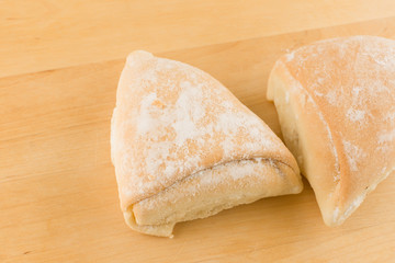 fresh pastry on a wooden tray