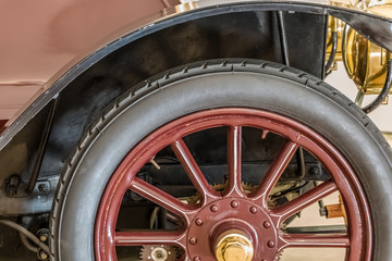 Detailed view of a classic car, detail of wheel zone, tire and mudguard