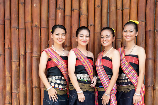 Group portrait of Kadazan Dusun young girls in traditional attire from Kota Belud district during state level Harvest Festival in KDCA, Kota Kinabalu, Sabah Malaysia.