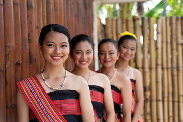 Portraits of Kadazan Dusun young girls in traditional attire from Kota Belud district during state...