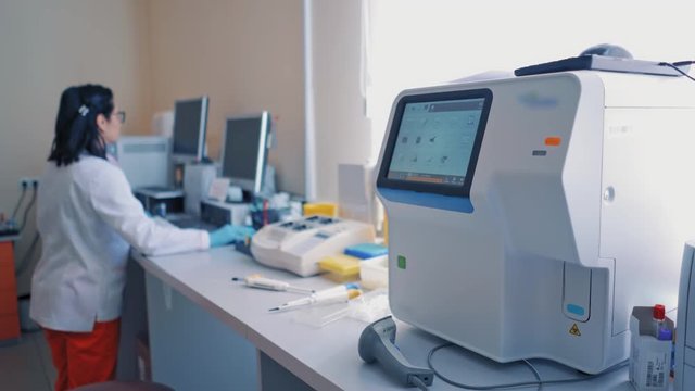 Research Centre With Innovative Equipment. Scientist carrying out an experiment in laboratory