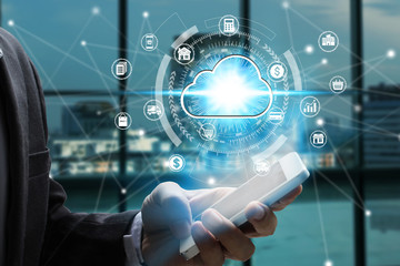 Businessman hand use smartphone with virtual cloud computing icon over the Network connection, Cyber Security Data Protection Business Technology Privacy concept