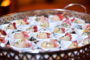 Obraz na płótnie Canvas lychee snack and parma ham, food background