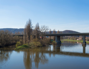 Fototapeta na wymiar bridge for train over river Berounka, spring suny day