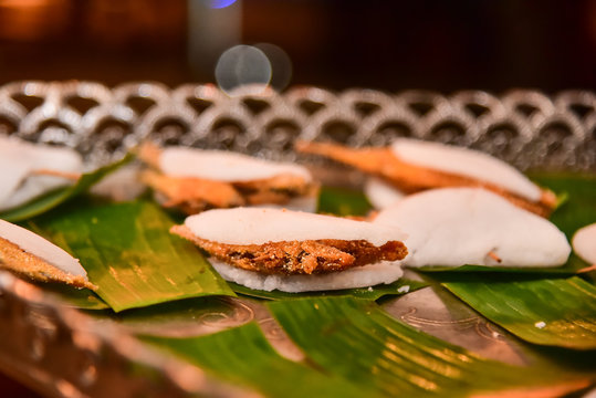 fried fish with tapioca, horizontal image, backgorund food, background gastronomy, ginga with tapioca, banana tree leaf, northeastern food, typical Brazilian food, Brazilian food,stuffed tapioca