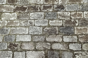 Old grey stone pavement background texture