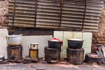 Cooking a meal in pots on the side of 