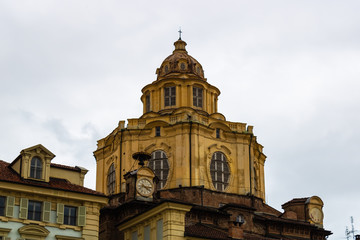 Fototapeta na wymiar San Lorenzo church view in Turin, Italy on a rainy day - Image