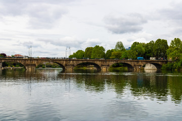 Fototapeta premium View at Po river, park and Bridge Umberto I in Turin, Italy - Image