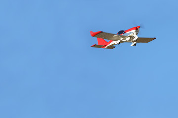 Yaslo, Poland - 9 3 2019: A light sport turboprop aircraft flies across the sky among the rainy clouds. Landing in difficult weather conditions. Meteorology and weather forecast for aviation