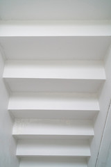 Under view of white modern architecture stairs
