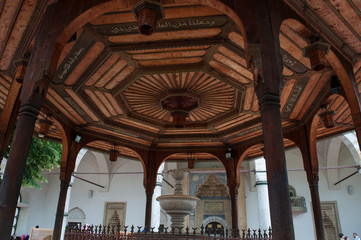 Sarajevo, Bosnia: the marble ablution fountain covered by a wooden decorated structure in the...