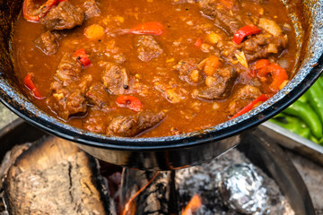 Ready kettle goulash after four hours cooking time over an open wood fire. With tomatoes, beef,...