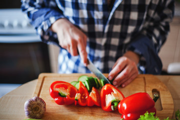 cutting vegetables on a cutting board