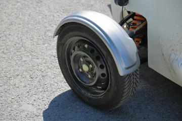 Front left wheel with winter tires of a small concept car