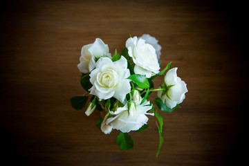 bouquet of beautiful white roses on table