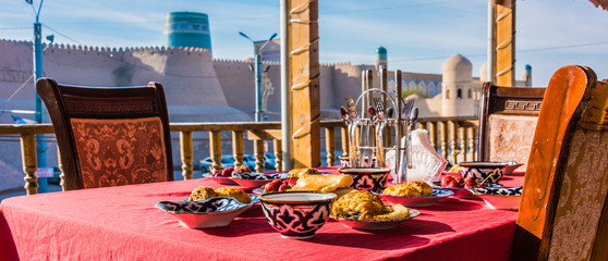 Traditional Uzbek breakfast served on the terrace - obrazy, fototapety, plakaty