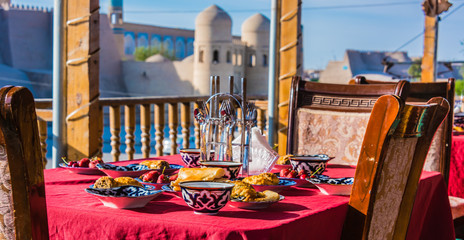 Traditional Uzbek breakfast served on the terrace