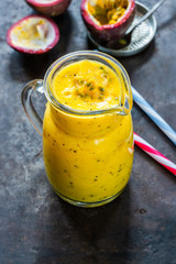 Tropical smoothie with mango and passion fruit