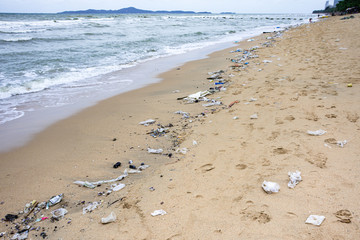 A lot of plastic debris littered on the beach, Pattaya beach ,Thailand, The environment is detroyed by human, Waste water sea from the neglect of human