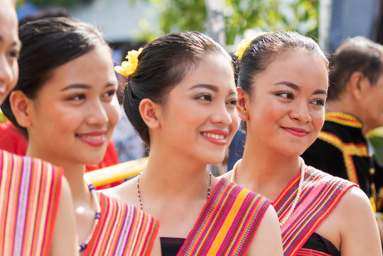 Portraits of Kadazan Dusun young girls in traditional attire from Kota Belud district during state level Harvest Festival in KDCA, Kota Kinabalu, Sabah Malaysia - selective focus.
