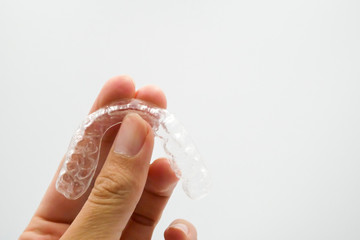 Clear plastic retainer teeth, it's a new technology equipment for orthodontist give the patient to orthodontic surgery in dental clinic or hospital
