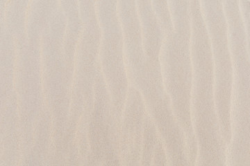 Fototapeta na wymiar Yellow sand with waves on beach