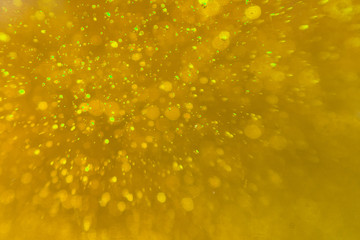 Yellow (gold) abstract sparkling background