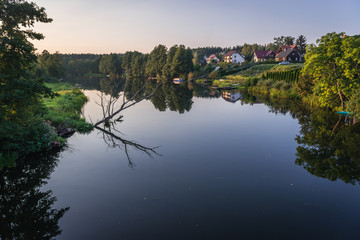 River Brda seen from a bridge in small Mecikal village, Pomorskie Region of Poland - obrazy, fototapety, plakaty