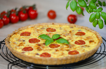Homemade quiche lorraine with bacon and cheese. French cuisine
