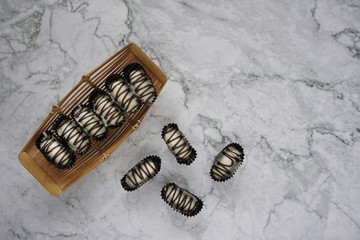 Chocolate almond london on a marble background.