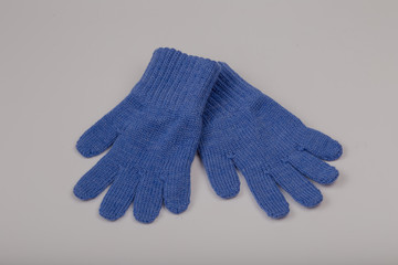 Children's winter gloves on a white background.