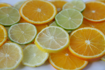 Orange, lime, lemon. Citrus fruit slices pattern, texture, background. Healthy food, detox, diet....