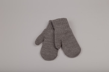 Children's winter gloves on a white background.